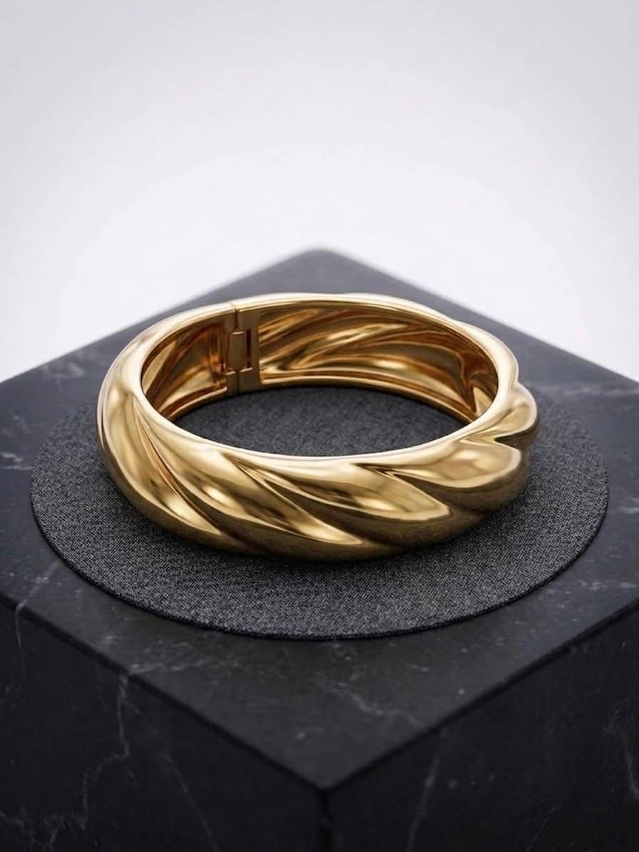 Golden swirl bracelet